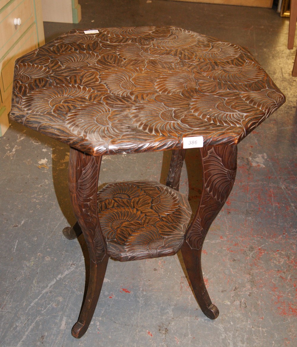 Heavily carved octagonal occasional table