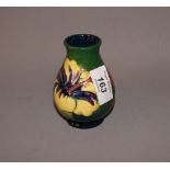 A small 'Coral Hibiscus' bulbous vase by Moorcroft CONDITION REPORT; Available on request. Catalogue