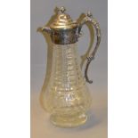 A good-quality cut-glass claret jug with a repoussé silver-plated mount