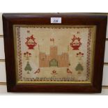 A Regency sampler by Sarah Stanfield in a period rosewood frame, dated 1836, depicting a castle.