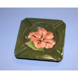 A Coral Hibiscus square ashtray by Moorcroft CONDITION REPORT; Available on request. Catalogue