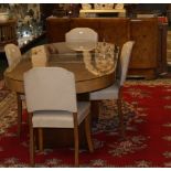 1920's Walnut veneered dining room suite, comprising of an oval dining table, six chairs,