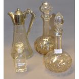 Two cut-glass decanters with stoppers,