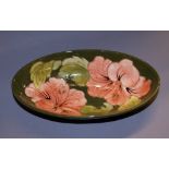 A Coral Hibiscus oval shallow bowl by Moorcroft CONDITION REPORT; Available on request. Catalogue