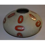A German Amano pottery squat-vase in grey, with red glaze. No.