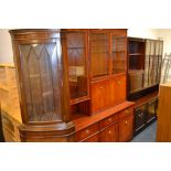 Two reproduction mahogany wall units and a corner cupboard