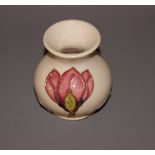 A small pink magnolia bulbous vase by Moorcroft CONDITION REPORT; Available on request. Catalogue