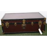 A large bound trunk with mounts and corners,