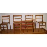 A set of four stacking theatre chairs,