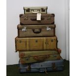 Six assorted vintage suitcases