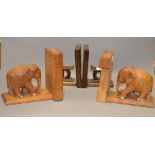 Two carved pairs of bookends