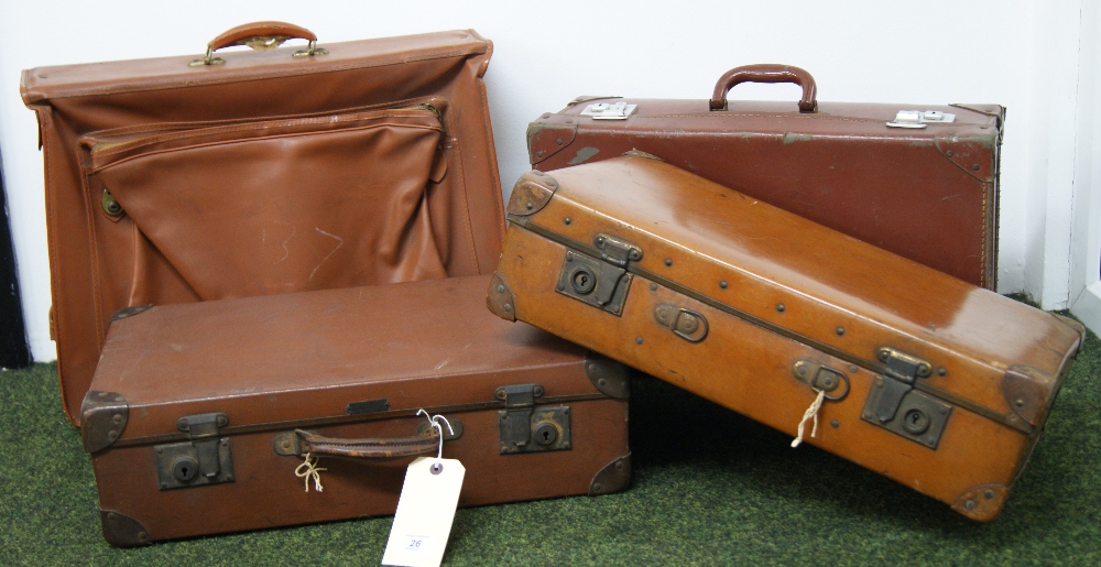 Four assorted vintage suitcases