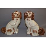 A pair of reproduction Staffordshire dogs