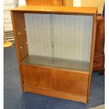 A vintage teak cabinet