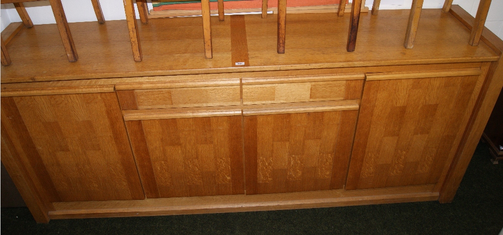 A contemporary oak sideboard of approxim