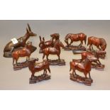 A collection of Oriental carved horses