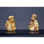 A pair of miniature carved bone oriental Netsuke,