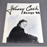 Johnny Cash and June Carter Cash autographs on a UK programme, 1984.