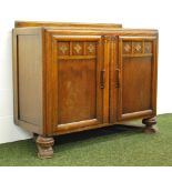 1920's oak two door sideboard with fitted interior.