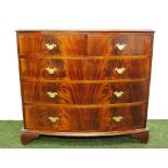 A flamed mahogany bow fronted two over three chest of drawers.