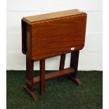 An oak drop leaf Sutherland table.