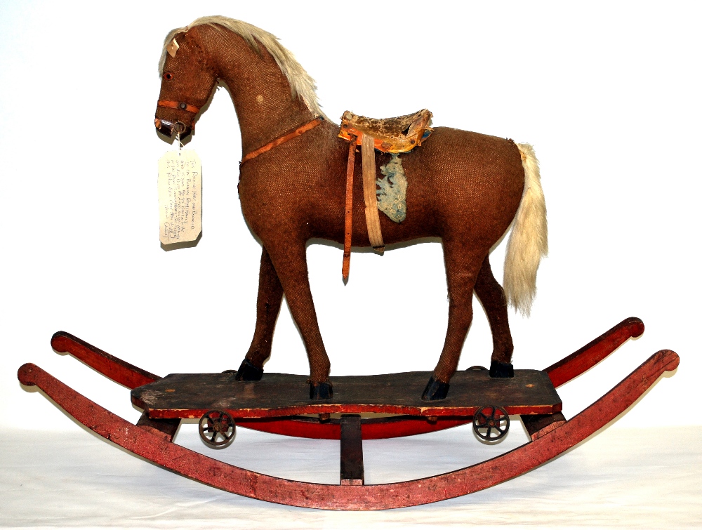 A late 19th century rocking horse, continental,