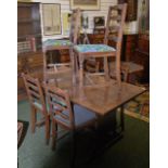 An oak dining suite with dresser,