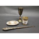 A hallmarked silver Kiddush cup, with chased detail.