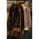 Five coats; three wool and two faux fur.