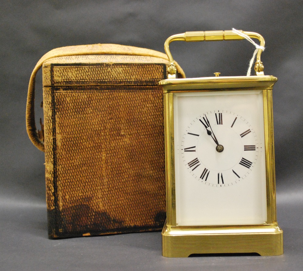 An Henri Jacot hour repeating lacquered-brass carriage clock, with enamelled Roman dial,