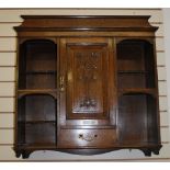 An oak Arts & Crafts wall cabinet.