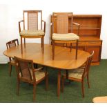 A G-Plan teak dining suite including six carver chairs,