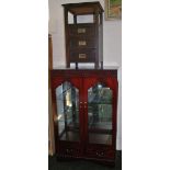 A mahogany two door glazed display cabinet. Approximately 125 cm x 76 cm.