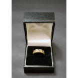 A 9ct gold dress ring,