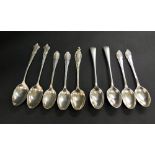 Nine hallmarked silver tea spoons and a silver-plated tea spoon.