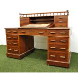 A mahogany twin pedestal Dickens desk,