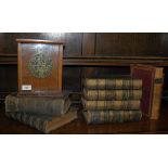 A selection of Victorian Welsh books along with a brass plaque for 1885 school sabbatical.