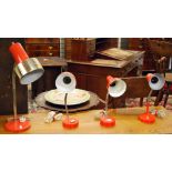 A selection of four vintage desk lamps and a table lamp.