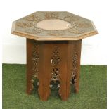 A highly carved continental hexagonal folding table