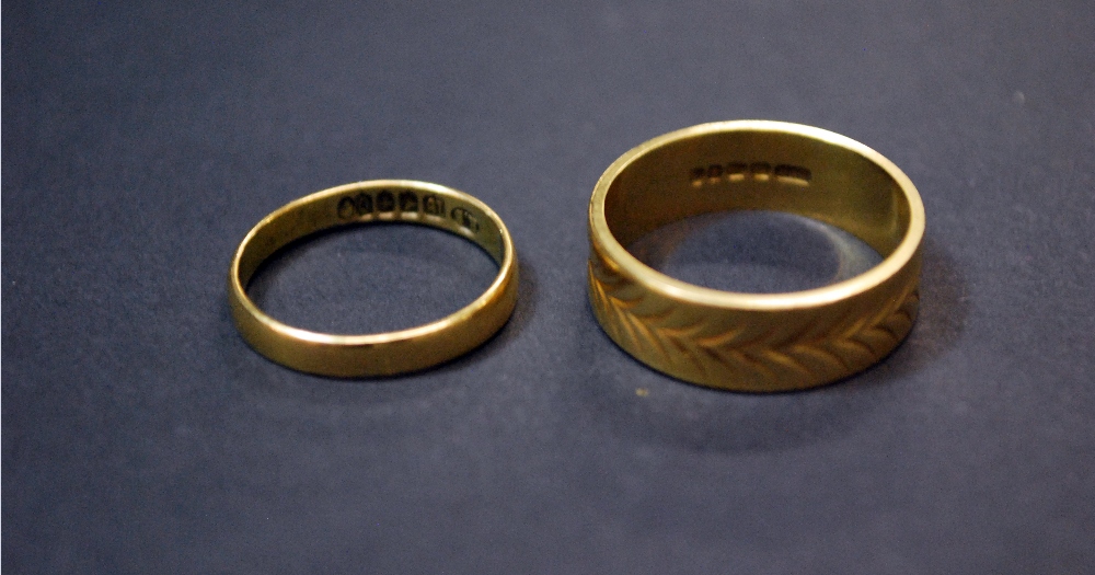 A Victorian 18ct gold wedding band, together with a substantial 18ct gold band.