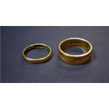 A Victorian 18ct gold wedding band, together with a substantial 18ct gold band.
