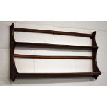 An Ercol Golden Dawn plate rack.