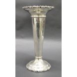 A hallmarked-silver trumpet vase. Weight approximately 101.