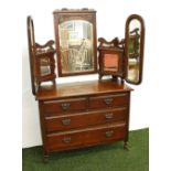 Victorian mahogany dressing table with mirrored cupboards.