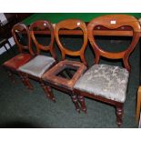 A set of four Victorian mahogany balloon-back dining chairs,