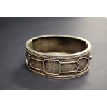 A Victorian hallmarked-silver snap-bangle with guard chain.