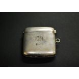 A hallmarked-silver vesta case, inscribed and dated 1918.