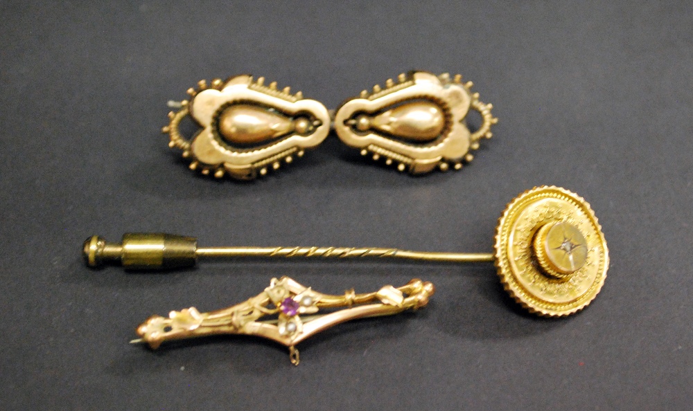 A Victorian stick-pin and two Victorian bar brooches. Combined Weight approximately 12.