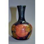 A Moorcroft 'Pink geranium' bud vase. Ap