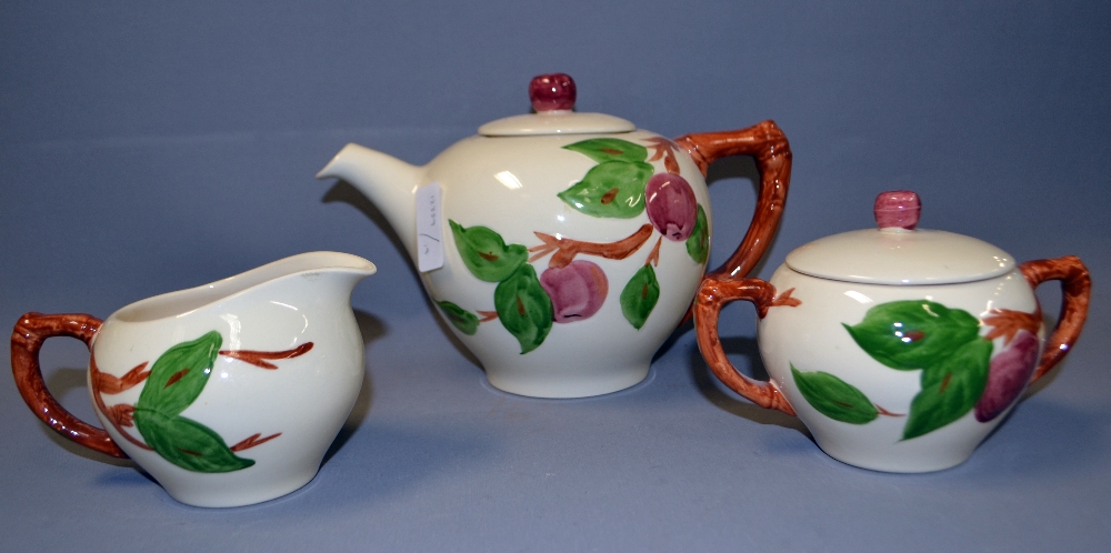 A contemporary three piece ceramic tea s